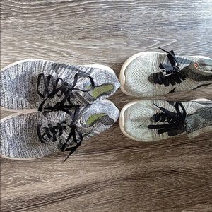 2 pairs of Nike running shoes